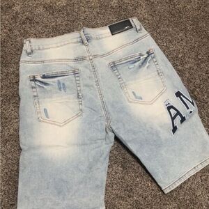 AMIRI Light Blue Jean Shorts with Distressed Details